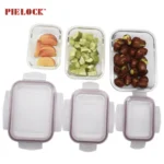 Three glass containers filled with fruits: sliced peaches, diced kiwifruit, and dates, alongside plastic lids.